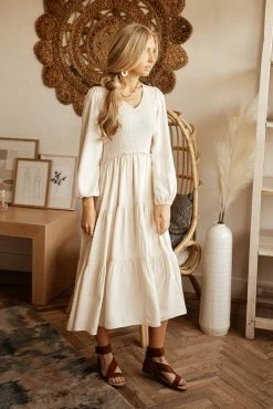 LUMIERE Smocked Tiered Midi Dress In Ivory Dresses