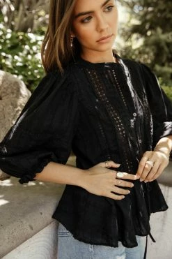 SEE AND BE SEEN Brinna Peplum Top In Black