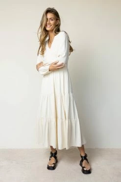 LUMIERE Smocked Tiered Midi Dress In Ivory Dresses