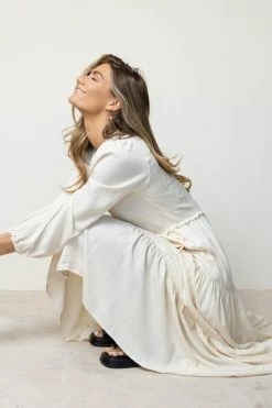 LUMIERE Smocked Tiered Midi Dress In Ivory Dresses