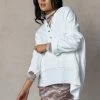 AEMI AND CO Brogan Hoodie In White Tops